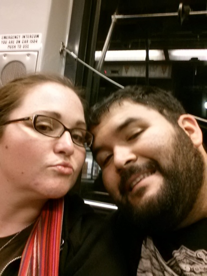 The hubby and I goofing off on the MUNI